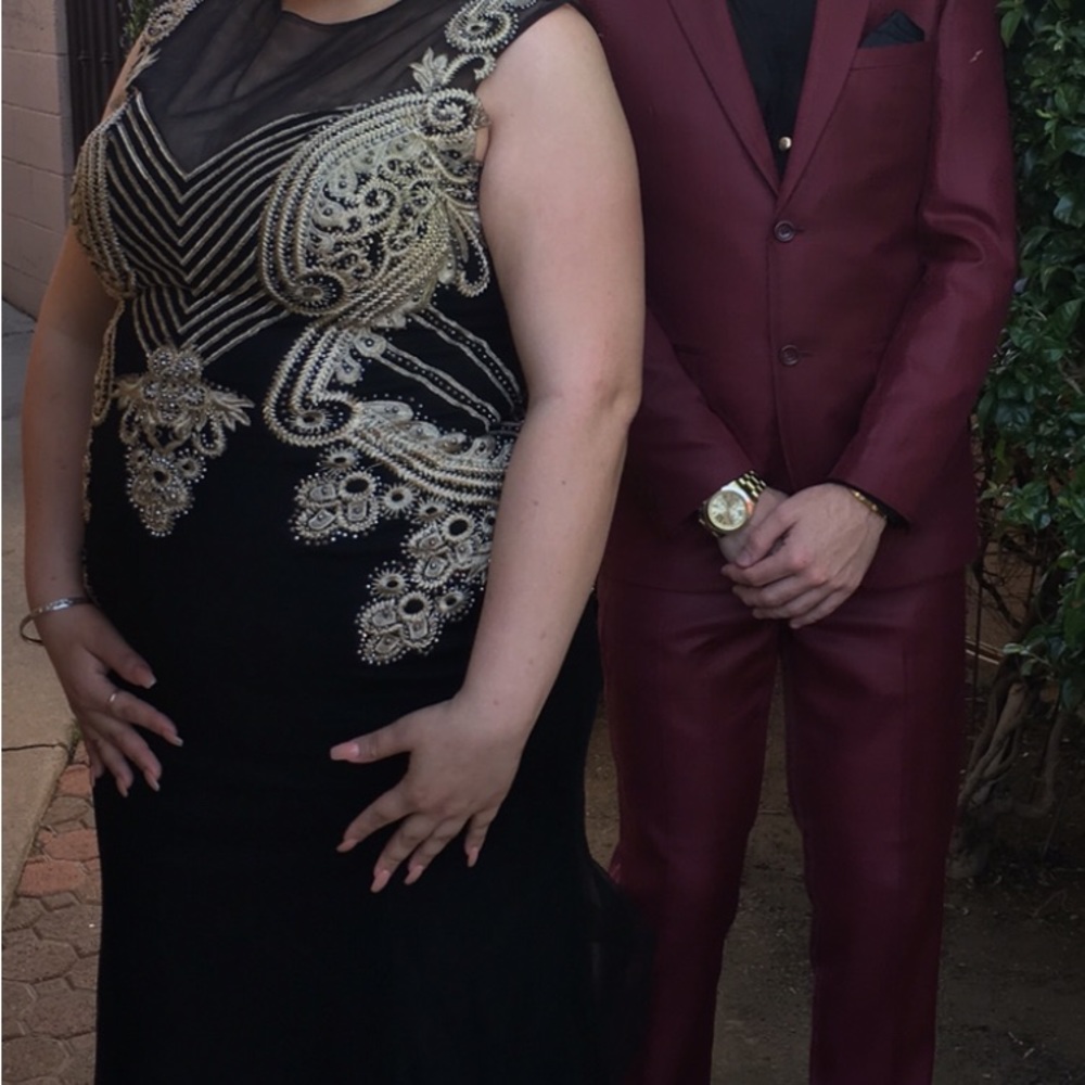 Black and gold dress size 16 bought in a Los Angeles boutique for $475 dollars